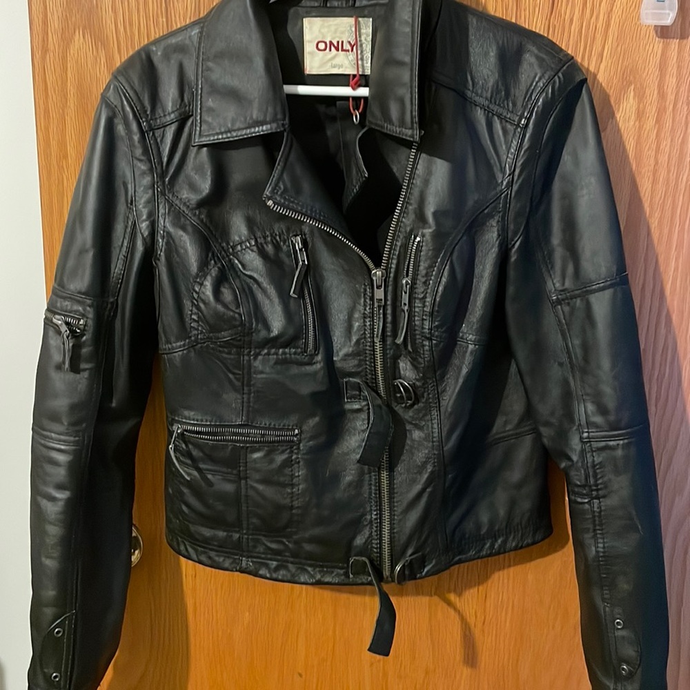 Black crop like style jacket.
